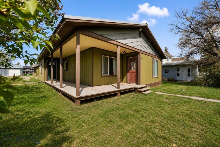 Located just one block off Main Street in Twin Bridges, this 3 bedroom, 2 bathroom home offers a practical layout, thoughtful updates and an open-concept living space. Set on 0.16± acres with lush lawn and a covered porch that wraps around two sides of the home, providing outdoor living space to enjoy your property.
Inside, fresh interior paint creates a clean, move in ready feel. The kitchen features hickory cabinets with great storage and easy access to the covered porch to grill any night of the week. The floor plan includes a primary suite with a walk-in closet and a full bathroom. The guest bathroom has been recently updated to accommodate the washer and dryer, offering flexibility with 2 possible laundry locations.
The detached 2-car garage is approximately 900 square feet, fully insulated and includes a separate room which may be ideal for an office, gym or studio. Easy parking options are available in the front of the home as well as alley access to the garage, adding convenience during winter months. The metal roofs add durability and low maintenance.
Twin Bridges is known for being a farm and ranch community with scenic Tobacco Root Mountain views and being surrounded by world-class fly fishing on the Beaverhead, Big Hole, Ruby and Jefferson Rivers. Conveniently located, the property is approximately one hour to Butte and about an hour and a half to Bozeman and the nearest commercial airport, keeping travel and amenities within easy reach while still enjoying small town Montana living.