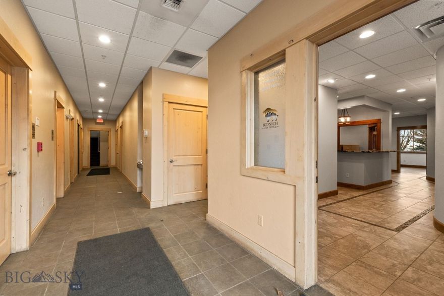 Maximize your business footprint with these Class A offices at 1940 W Dickerson Street. This asset offers an expansive and versatile floor plan designed to accommodate a wide range of professional uses from a flagship medical clinic, law firm, or any other professional service. Located just off the high-traffic intersection of 19th and Dickerson, your business will benefit from premium visibility and easy access for clients and staff alike. This beautiful commercial condo features 2,959 square feet of flexible space across 6 offices, a reception area, a functional kitchenette and a half bath. The offices have wonderful natural light with top down/bottom up blinds for client privacy, and plenty of paved parking for client convenience. Position your brand in one of Montana’s fastest growing commercial corridors.