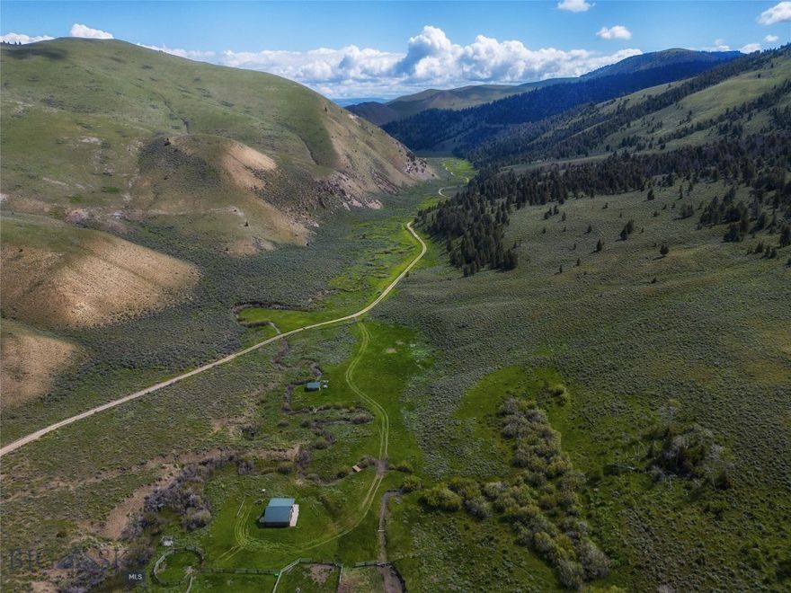 Discover your own southwest Montana retreat with this rare 30-acre parcel nestled beneath the stunning Lima Peaks. This property is bordered on three sides by US Forest Service land, offering direct access to thousands of acres of untouched wilderness for endless recreation, hunting, and horseback riding. A rustic one-room homestead cabin sits on the property, alongside a log barn, with horse corrals, making it ideal for those seeking a simple rustic getaway. Natural water features include a seasonal creek - the Middle Fork of Little Sheep Creek and two developed springs, providing both beauty and valuable water sources. This property combines peace, privacy, and proximity to outdoor adventure. Whether you’re looking for a recreational retreat, hunting basecamp, or the perfect spot to build your Montana homestead, this unique acreage has it all. The nearby Middle Fork Trailhead takes you to some of the most amazing hiking, hunting, and horseback riding trails in Montana. For many years the owners' operated a successful outfitting business and packing school from the property. Non owner public access is restricted Dec. 15 - May 15 for elk habitat, creating a very private setting. Ancient Shoshone-Bannock petroglyphs can be found in the area, and the parcel has a homestead entry survey from 1917. Located close to the rural town of Lima, MT, it is an hour from Dillon & 1.5 hours from the airport in Idaho Falls, ID.  Call today for more information!