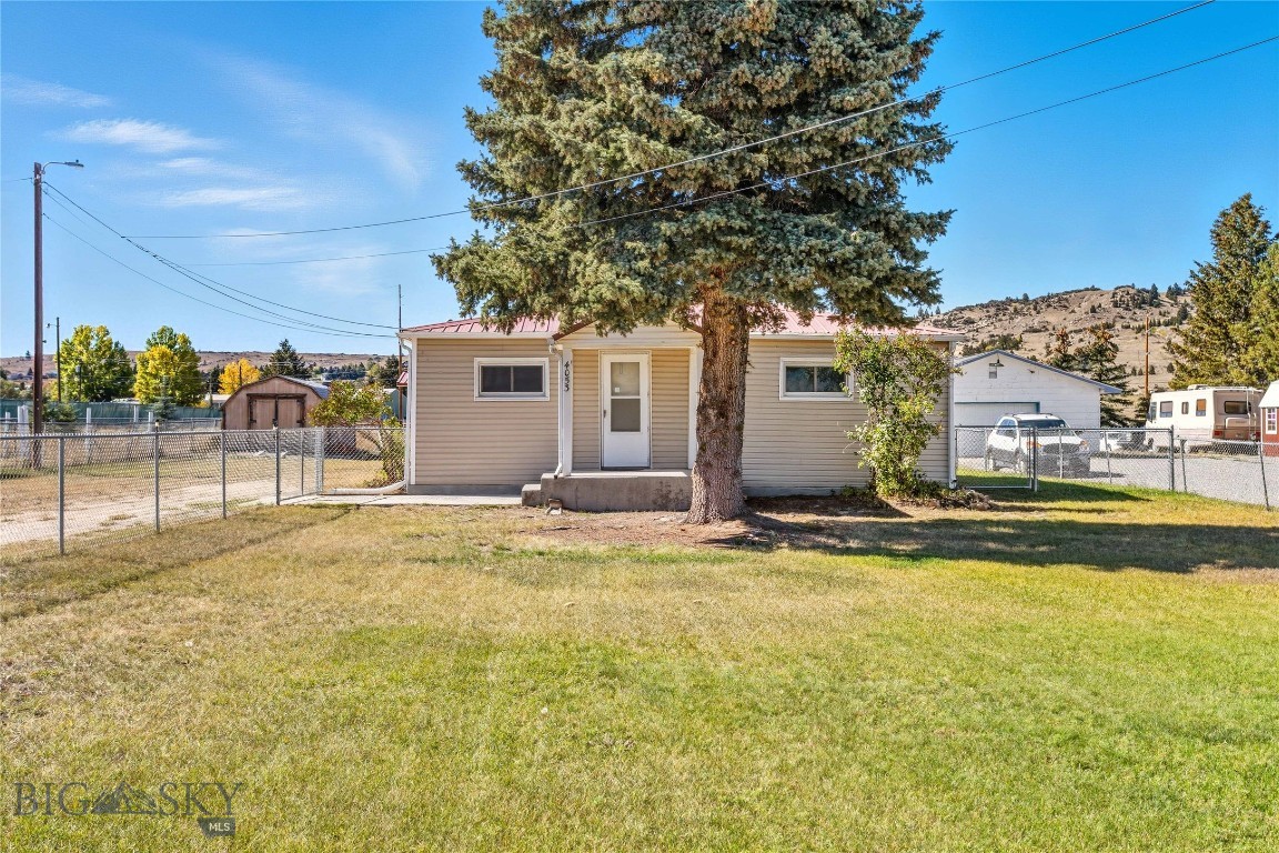 This adorable 2-bedroom, 2-bathroom home sits on 1.66 acres and offers a rare opportunity to live and work on the same property. Zoned M1 (Light Industrial), the possibilities here are extensive-whether you're looking to run an auto repair shop, custom cabinet or furniture studio, welding shop, greenhouse or nursery, or even a feed and seed operation, this property supports over 61 permitted commercial and industrial uses under current zoning regulations. Newly renovated with modern comforts and style, including updated wiring and plumbing, new kitchen with modern finishes, new flooring throughout, two beautifully remodeled bathrooms. An additional lot behind the house is included, providing additional space for your business, hobby, or expansion plans. No matter your interests, 4053 Wynne offers the perfect blend of residential comfort and industrial opportunity. Schedule a showing today and discover what this one-of-a-kind Butte property can offer you!
