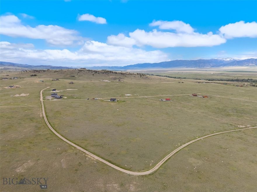 Located on a desirable corner lot at the intersection of Stage Coach Trail and Chipmunk Trail, this nearly 7-acre parcel in the scenic Shining Mountains Neighborhood offers a unique opportunity to create your Montana retreat with multiple access points and exceptional flexibility for home placement.
The property features numerous level building sites, allowing you to frame the panoramic mountain views from virtually any angle. Whether you're envisioning a rustic cabin or a modern ranch-style home, this lot provides the space and setting to bring your vision to life.
With fiber optic and power available in the area, you can enjoy modern connectivity without sacrificing the peace and beauty of the Montana landscape. With easy access from Hwy 287 and Varney Bridge, this parcel is just 20 minutes from Ennis and one hour from Bozeman Yellowstone International Airport. Outdoor recreation is close at hand, with nearby access to hiking trails, alpine lakes, the renowned Madison River, premium Blue Ribbon trout fishing, and prime hunting grounds.
Experience wide-open skies, sweeping vistas, and endless potential—this is Montana living at its best.
