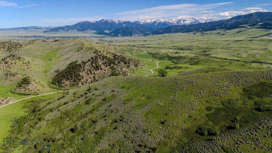 OC Ranch is a rare offering located at the heart of one of America’s most visually stunning regions. Framed by iconic mountain ranges—the Absarokas, Bridgers, Highlights, and the Crazy mountains— this exclusive collection of 160± acre ranch properties offer a rare blend of privacy, breathtaking setting, and potential to create a legacy property. Buyers can purchase the entire 640-acre ranch or choose from four, 160-acre parcels. With rolling meadows, benches, and panoramic views in every direction, OC Ranch holds a commanding position between heritage ranchland and the towering wildlands of southwest Montana. Though deeply private, the ranch is remarkably accessible, just 25± minutes from Bozeman, 15± minutes from Livingston and the Yellowstone River, and nearby hundreds of thousands of acres of public land. On the property itself, owners enjoy not only their own expansive tracts but also 10± miles of private shared hiking, mountain biking, or horse trails that wind through ridgelines, valleys, and open country, offering constant connection to the land’s grandeur and the surrounding peaks. Spring and summer bring the land to life with native grasses, sagebrush, wildflowers, and dense foliage along the north-facing slopes and creek corridors. Wildlife, including elk, moose, black bear, whitetail and mule deer, and other species of wildlife found in the Yellowstone ecosystem, find sanctuary throughout the varied topography. Underground power, year-round access via newly built roads and bridges, and a thoughtful development plan ensure that modern convenience doesn’t come at the cost of natural beauty. Each parcel includes access to meadows, ridges, O’Rea Creek frontage, and benefits from some of the neighboring properties under conservation easements that ensure protected viewsheds and thriving wildlife habitat. With four distinct tracts available, each offering a unique blend of terrain, orientation, and build opportunity— OC Ranch is a legacy holding that provides the rare combination of privacy, proximity to amenities, and limitless mountain views. OC Ranch Tract 4 description: Mix of low meadows, moderate climbs to commanding views, and high mountain ridges, and the most significant north valley frontage to the creek.