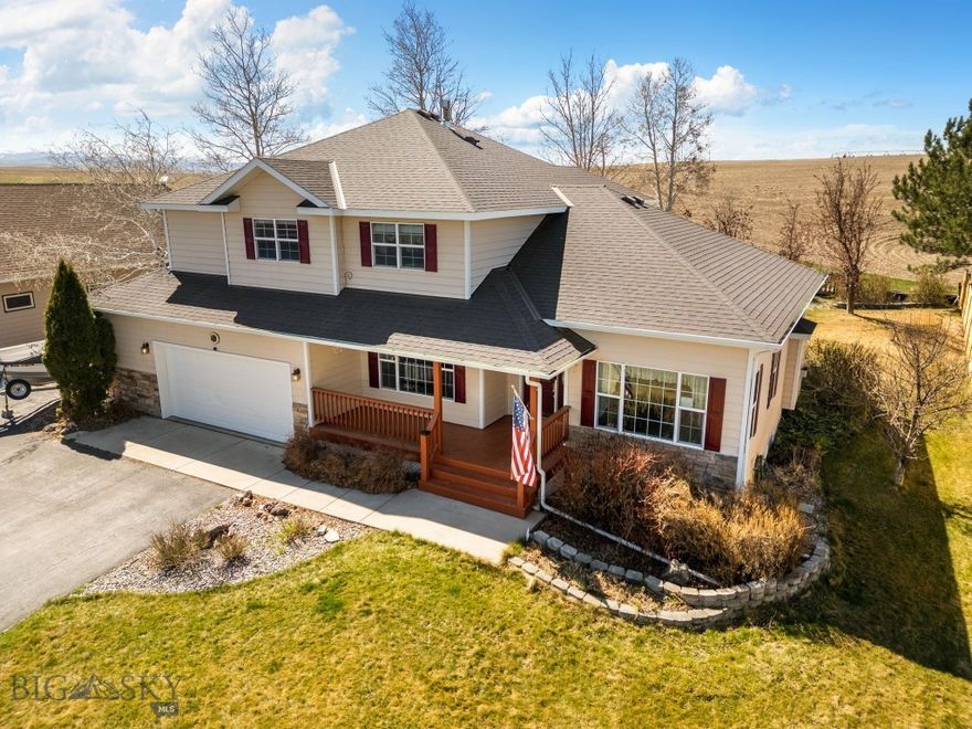 Set against a backdrop of expansive views and open farmland, this exceptional 4 bedroom plus den property offers the rare combination of a peaceful cul-de-sac country setting just minutes from downtown Bozeman. Whether enjoying a quiet morning coffee on the covered front porch or unwinding on the back deck with its retractable awning, the setting invites you to slow down and take in the surrounding beauty and wide-open skies. The thoughtfully landscaped grounds feature a striking three-tiered landscape bed bordering an agricultural field, along with mature trees, shrubs, underground sprinklers, and a partially fenced area ideal for pets. With limited HOA and a paved RV pad allowing for seasonal parking of campers or boats, the property offers both freedom and functionality. Inside, the spacious main level is designed for comfortable living and entertaining, featuring a mudroom, laundry area, open kitchen and dining space, formal dining room, and a large living room anchored by a fireplace, along with a versatile den. The expansive primary suite serves as a private retreat, complete with dual vanities, a walk-in shower, and a jetted soaking tub. An attached extra large two-car garage provides additional space for storage, recreational gear, or a workshop setup. Additional features include a water softener, central vacuum and included washer and dryer. Offering space, flexibility, and an unmatched setting so close to Bozeman, this property presents an exceptional opportunity to enjoy Montana living at its finest.