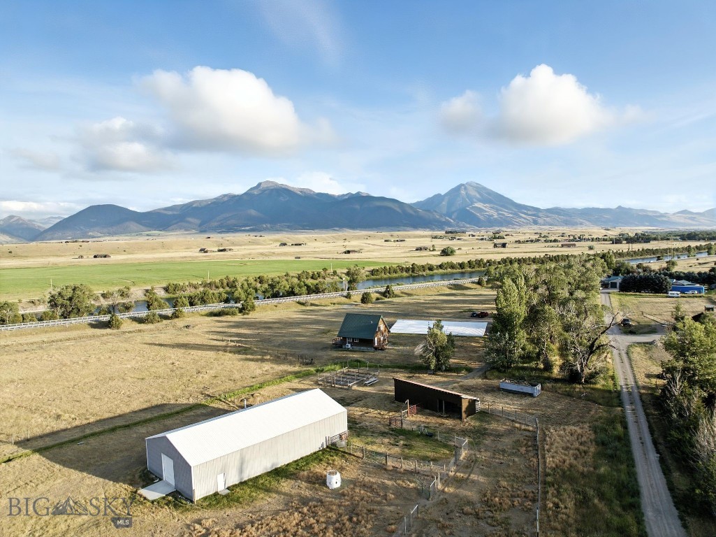 Paradise Valley Dream, this property has it all, two single family homes, over 12 acres, Yellowstone River access right across the road, 40X80 shop with 220V, 12X48 loafing shed, fenced pastures, incredible Absaroka Mountain Views, no HOA and minimal covenants. Primary home is owner occupied, land berm, 2736 sf, 3 BR, 2 BA single level living, southern exposure, wonderful passive solar, with attached single car garage. Guest home is 1155 sf, 2 BR, 1.5 BA with deck overlooking Yellowstone River and Absaroka Mountains. Guest home has been proven to be a very profitable short term rental but has been used exclusively by family for the past three years. The two homes share a well and each have a private septic, updated and central heating systems in both guarantee year round comfort. Located mid way between Livingston and Yellowstone National Park, freedom to enjoy all that Montana has to offer.