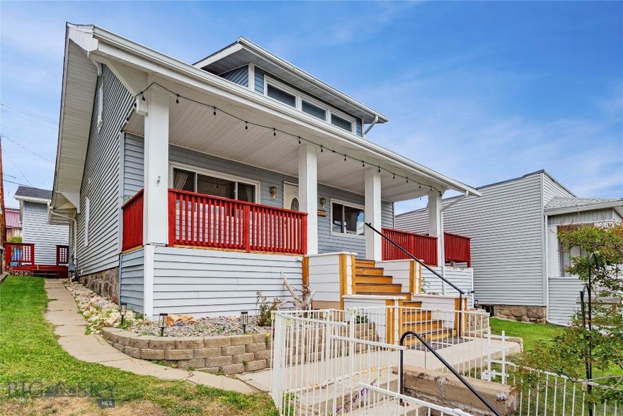 Charming 3-bedroom, 2-bath Craftsman in Uptown Butte with bonus room, off-street parking, and an oversized 2-car garage (all hard to find in Uptown Butte)! The main floor includes real hard wood floors throughout, a living room with gorgeous views of the Highland Mountains, a tastefully remodeled kitchen (2021), dining area, primary bedroom, and two bathrooms—one with brand new washer and dryer and in-floor heating. The upstairs offers two oversized bedrooms and a versatile bonus room. Outdoor features include a brand new cedar front porch, a wrap-around deck with views, and a privacy fenced back living space perfect for grilling or enjoying a fire pit (2022). The yard is equipped with underground sprinklers. The oversized two-car detached garage is heated with a remote-controlled unit making it ideal for year-round use and is located with a convenient path to the mudroom and kitchen. Additional updates include a new roof (2020), restored boiler, and new temperature zone controllers. Located on the north side of the street, the home enjoys abundant sunshine and quick snow melt in the winter months. Convenient location near Montana Tech, the paved BA&P trail system, the Big Butte Recreation area and trail system, and Excelsior Meats!
