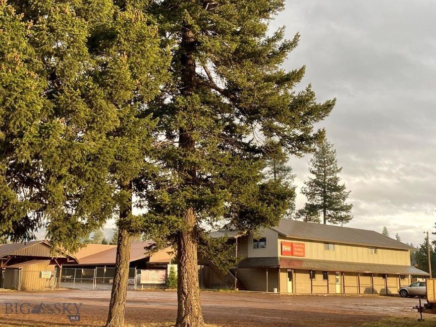 Timberline Building Materials - This independent building supply center in Seeley Lake, MT offers an income opportunity for a second career or for a larger operator to expand their operations into a thriving building materials market. The income numbers for this business have improved substantially each year. Being offered is the long established business, real estate, in a prime Seeley Lake location, with room to expand the business into additional market opportunities, as well as delivery truck, fork lift and business equipment. The property consists of 2,160 sq ft sales center with 2,160 rentable sq ft above, multiple outbuildings and lumber storage sheds, and security fencing all on 1.77 acre. High visibility corner parcel with 245 feet frontage on the bustling Highway 83.