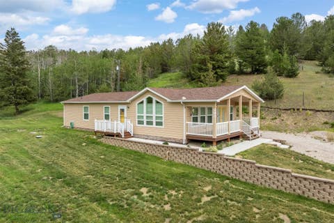 Photo of 192 Geary Gulch RD, Anaconda, MT 59711 (MLS # 413629)