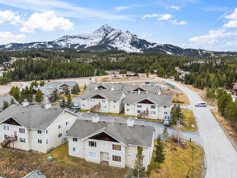 Photo of 13 Moose Ridge Rd #8, Big Sky, MT 59716 (MLS # 406931)