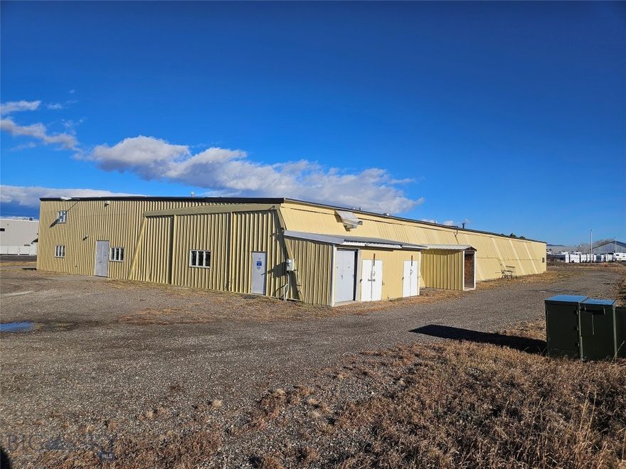 This ±22,000 SF warehouse with office and yard space, situated on 3.99 acres, is available for lease. Located just off of Huffine Lane (Highway 191) the property is serviced by a well, a substantial septic system, natural gas, compressed air, and 1200 AMPs of three-phase power. Originally built in 1985, added onto in 1998, the steel building is ready for a new tenants. The property is presently configured for a single user but has plans to be demised for qualified tenants into 3 units. Estimates are 6,600, 4,200, and 11,300 SF in size. This property is centrally located just West of Bozeman, 15 miles from Interstate 90 and a 30 minute drive to Big Sky. The property is suitable for large trucks/semis with multiple points of access, equipment storage and laydown yard. The offering is well suited for manufacturing, shipping and receiving, warehousing, distribution operations, along with other industrial and commercial uses.