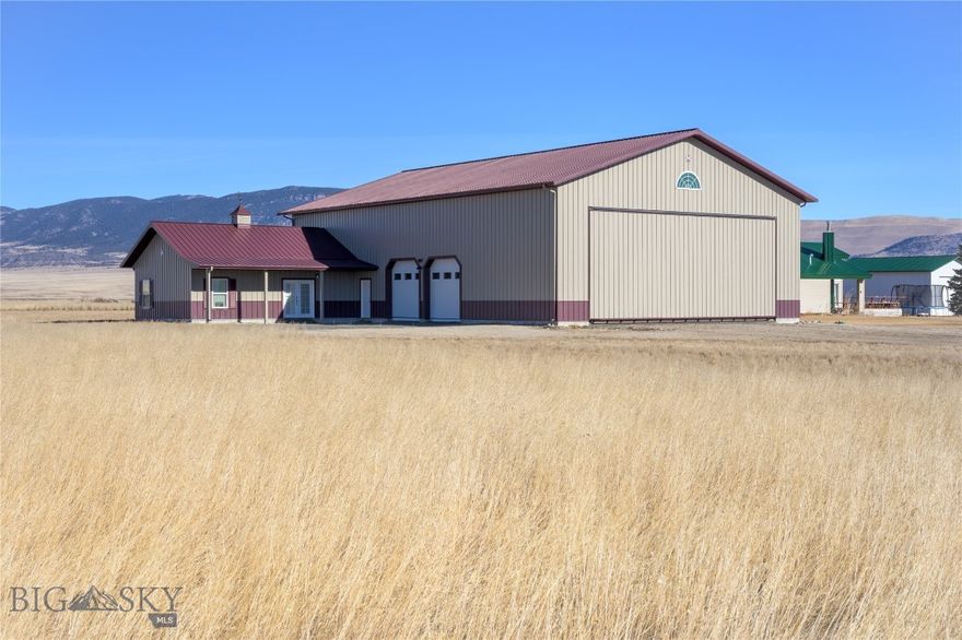 This top-notch quality Morton steel building built in 2023 was designed to accommodate both an airplane hangar and attached living quarters. Thirty feet high and boasting over 5,000 square feet, this structure is located on a 1.08-acre lot in the Jefco SkyPark subdivision in Whitehall, Montana and is adjacent to the turf runway of Airport MT-41. Land your plane and use the remote control to lift the 17 x 42-ft. Powerlift one-piece insulated hydraulic hangar door and taxi right inside. In addition, there are two 10'x10' commercial-grade garage doors. The building sits upon a 5' deep x 1' concrete foundation wall with -4" grading, has a new septic system installed (Jan 2024), and electricity (Vigilante Electric) into the property. The interior space is unfinished and ready for build-out: it is framed, insulated, and has Pella windows with blinds for what could become a customizable 1800 square foot two story dwelling. Conveniently located close to I-90, this property offers a unique opportunity for an aviation enthusiast or someone looking for a large shop.