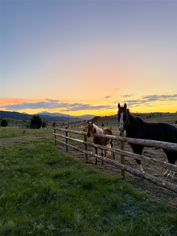 Welcome to this stunning 25.9 +/- acre parcel in the mountains of Ramsay, Montana, bordering Forest Service land. This property is already equipped with fencing for horses/livestock, a private well, power, a new driveway, shed, and a framed-in home ready to finish and make your own. You’ll enjoy endless views, abundant wildlife, and a prime location close to Fairmont Hot Springs, Old Works Golf Course, Discovery Ski Area, Georgetown Lake, and miles of hiking and biking trails. Don’t miss your chance to own a piece of Montana paradise!