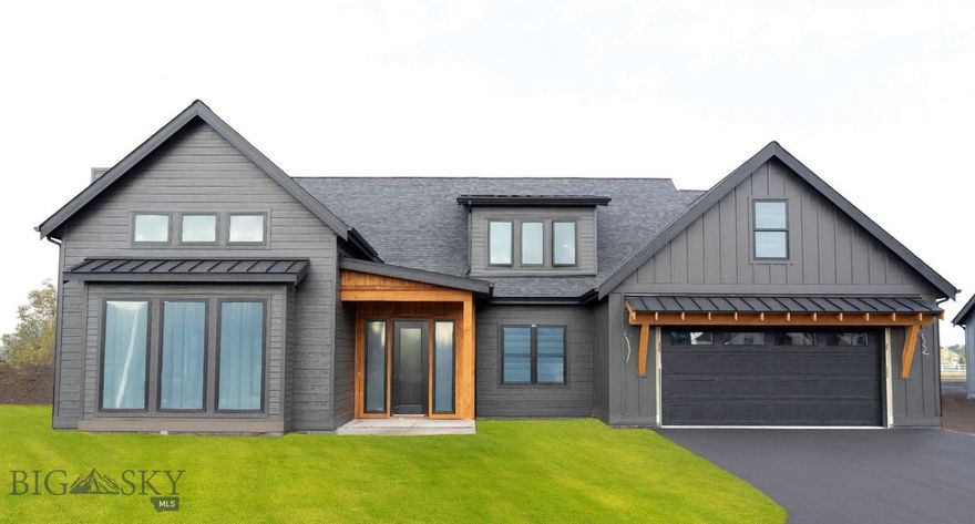 Welcome to your brand-new home in Creekside, one of Bozeman’s most desirable neighborhoods. With 3,268 square feet of thoughtfully designed living space, this home blends modern style with everyday functionality—all while keeping you close to the very best of Bozeman. Downtown, MSU, shopping, dining, and outdoor recreation are just minutes away, giving you easy access to everything from morning coffee runs to mountain adventures. Inside you’ll be greeted by soaring 10-foot ceilings and an open-concept main level that’s perfect for gathering. The great room centers around a sleek fireplace with floor-to-ceiling detail, while wide-plank oak floors flow seamlessly into the dining area and gourmet kitchen. The kitchen is a showpiece with quartz countertops, a large island, custom cabinetry, a walk-in pantry, and a premium KitchenAid appliance package. The main-level primary suite is a private retreat featuring a spacious walk-in closet and a spa-like bath with a soaking tub, tiled walk-in shower, and double vanities. Also on the main floor, you’ll find an office/guest bedroom, 3/4 bathroom, mudroom with custom built-ins, and a laundry room finished with quartz counters and designer tile. Upstairs offers incredible flexibility with two additional bedrooms, a full bath, a large bonus room, and a 25-foot flex space—perfect for a second living room, gym, or playroom. Outdoor living is easy with both a covered patio and covered porch, while the garage provides plenty of room for vehicles, storage, and gear. Every detail has been carefully selected, from designer lighting and modern trim to custom tile and high-efficiency systems. With its ideal Creekside location and proximity to trails, parks, schools, and all of Bozeman’s amenities, this home delivers both convenience and lifestyle.