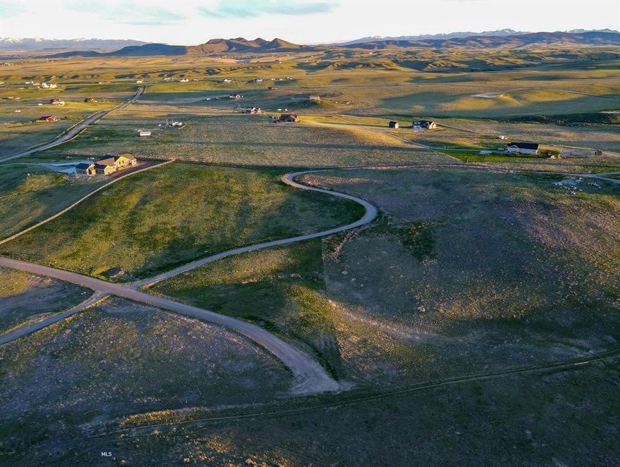 Beautiful 5.05 acre lot with minimal covenants that allows the ability to build multiple structures including a shop. allowed. Some animals/livestock allowed. (All subject to HOA approval in neighborhood.) This is ideally located close to Three Forks, Bozeman, Canyon Ferry Lake, Copper City Bike Trails, Helena, Ennis, and Butte, which means many recreational activities close by and a minimal commute to work! The elevated level build site and gently sloping north face would be ideal for walk out basement as well as providing sheltered pasture for livestock. Beautiful panoramic views are available from every angle of this 5 acres!