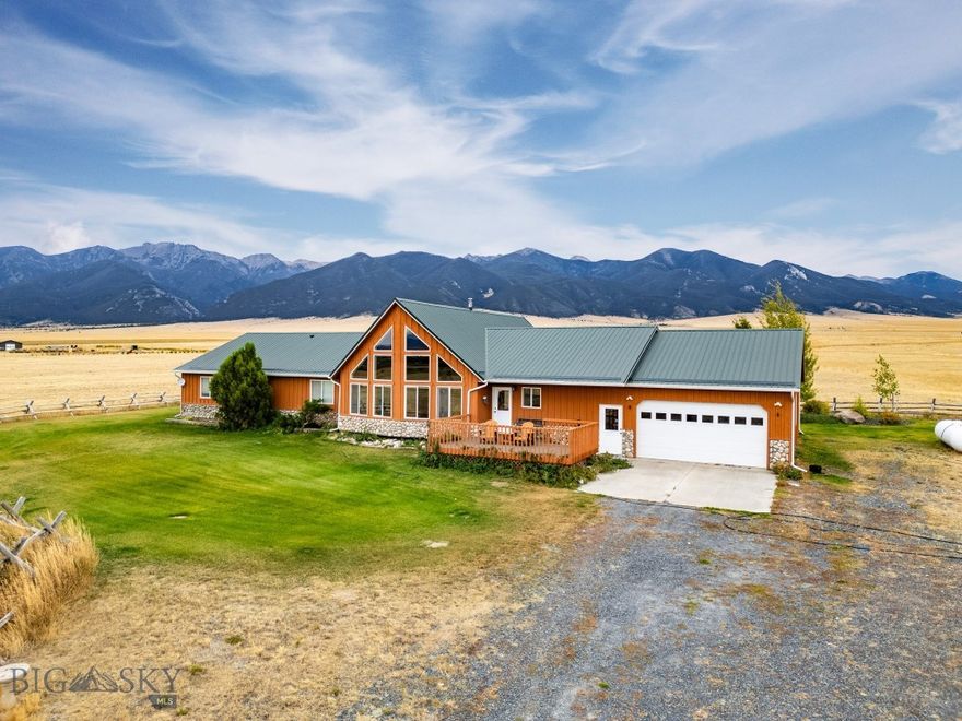 Welcome to your Montana dream property—where sweeping mountain views, open skies, and 45 acres of privacy create a lifestyle that feels worlds away yet minutes from town. This custom 3-bed, 2.5-bath home offers 2,858 sq ft of rustic elegance, blending craftsmanship, comfort, and freedom. 20-foot vaulted knotty-pine ceilings, hardwood finishes, and picture windows frame the Tobacco Root Mountains. The open-concept great room flows into a chef’s kitchen with stainless steel appliances, custom cabinetry, and an island made for gatherings. The primary suite includes deck access, a spa-style bath, and a walk-in closet. Outside, enjoy partially fenced and cross-fenced land, a shop, and room for horses or hobbies. Watch sunrise and sunset from the front deck or explore nearby trails and town. Convenient to Bozeman, Butte, and Helena—this is true Montana living.