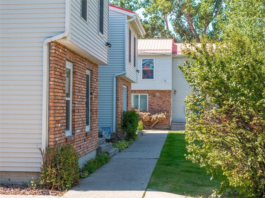 This wonderful Condo is Now the Lowest Price Per Square Foot in Bozeman!

This beautifully upgraded 3-bed, 2-bath condo offers modern convenience, charm, and a perfectly central location in town. Recent renovations include brand-new flooring, multiple new windows, and a fully remodeled main-level bathroom.

The main floor features a bright living room, a kitchen that opens to the dining area, and access to a private patio and green space. Downstairs, enjoy a finished lower level perfect for a TV room, office, or flex space—plus a laundry area and extra storage. Upstairs are three generously sized bedrooms and a refreshed full bath.

Situated in a quiet, bike-friendly neighborhood with Bridger Mountain views and unbeatable proximity to MSU, downtown, trails, and shopping—this condo blends style, space, and location. The HOA covers trash, sewer, water, and all exterior maintenance.

Don’t miss your chance to tour this centrally located gem!