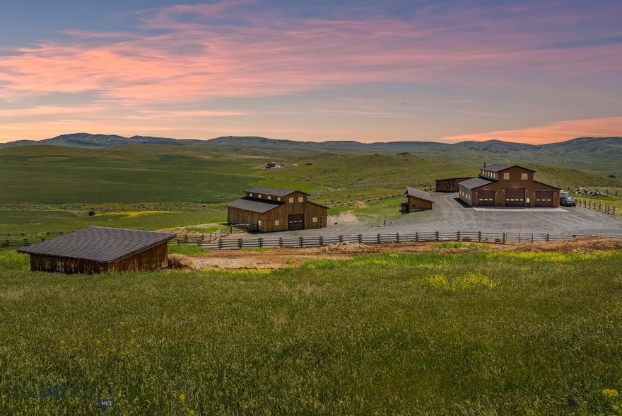This GEM is one-of-a-kind, it will be hard to find a property with all the amenities Dalesview provides. The 38-acre estate is nestled at the end of a private road. With 360-degree panoramic views! This remarkable property boasts a custom 4800 SQFT +/- custom-built shop that has automatic roll-up doors on both sides to fit semi's. Above the shop is an impressive 1440 mSQFT +/- living quarters with 3 bedrooms, 1 bath and flex room that could be another bedroom. Additionally, you'll find a six-stall custom barn spanning 2464 +/- SQFT, two 1568 +/- SQFT loafing sheds with power, and 4ft +/- concrete walls with slidng bard wood doors, as well as a smaller 1000 SQFT +/- with two rollup doors and power. Each structure has been built with quality materials and contractors. The entire estate is enlcosed, making it the perfect home for all your beloved animals. Plus this exceptional property offers you the unique opportunity to craft a bespoke home, meticulously designed to meet your every need.