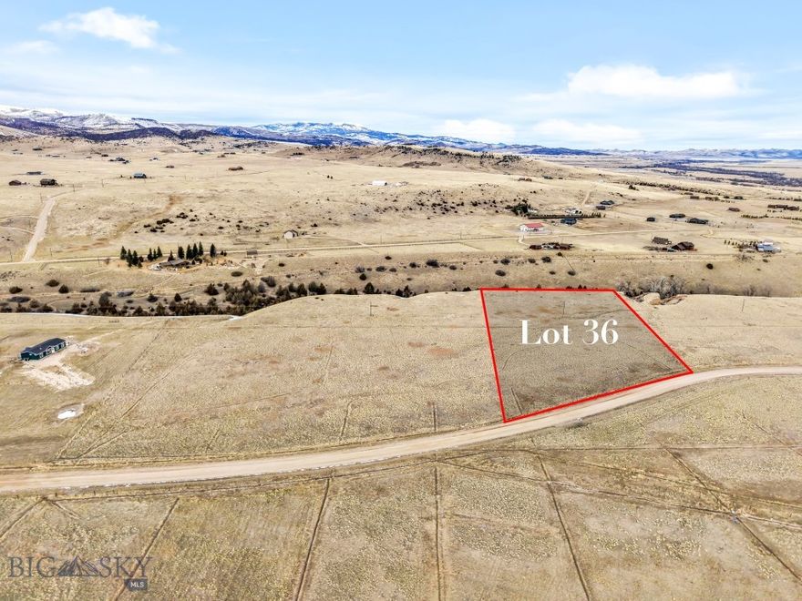 One of three 5+ acre parcels overlooking Blaine Spring Creek. Many building locations & room for a shop, barn, etc. Irrigation water available with paid annual water dues of $75/lot. Annual HOA dues are $200/lot. The HOA has a $2500 fee to build which goes into road maintenance. Power runs across the lot so hookup should be reasonable. Owners have access to the private stocked Haypress Lakes. Just a short drive to the Varney Fishing access, public land & Axolotl Lakes. Photos are across & of all 3 lots. Also available are MLS 401265 & MLS 401266.
