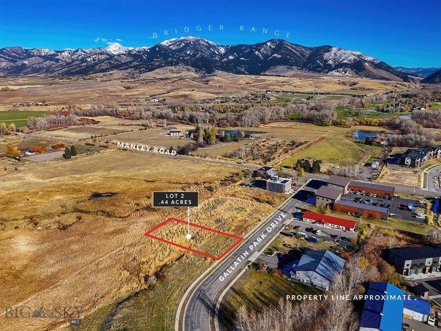 Lot 2 in the Gallatin Park neighborhood is one of three adjoining lots available.  Situated on the north end of the development, these lots have unobstructed Bridger Views.  The development includes a wide variety of buildings, including live/work condos, commercial warehouses and businesses of all kinds.  These lots are zoned M-1 for light manufacturing, offering a blank canvas for a variety of development possibilities to meet your needs.  The area has beautiful views, is positioned for growth, easily accessible, and provides the ideal foundation for your next commercial project.  Just across Manley Road is the Glen Lake Rotary Park with large lake and walking trails and MAP Brewing is just down the street.  Plans for a live/work condo building encompassing all three lots is available upon request.