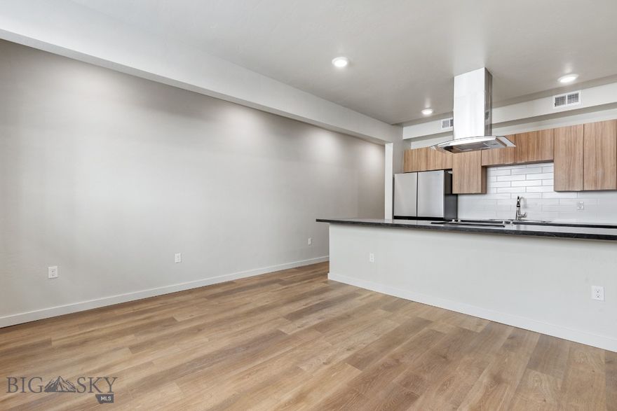 Experience modern living in historic Uptown Butte at Rudolph Condos, Butte's newest condominium development. This 1-bedroom, 1-bathroom condo features an open floor plan and exposed brick. The stylish kitchen boasts stainless steel appliances, while the spacious living area is perfect for entertaining. Located in the heart of Uptown Butte, you’ll enjoy easy access to dining, shopping, and local attractions. Don’t miss this rare opportunity to own a contemporary condo in a vibrant, historic setting!