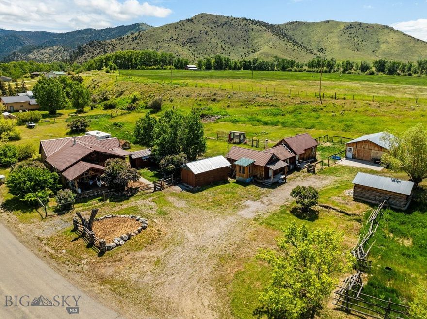 Tucked just under 3 miles from the picturesque town of Sheridan, Montana, this unique 2.4± acre property offers a blend of comfort, versatility, and rustic charm. The main residence features 2 bedrooms and 1.5 bathrooms with distinctive blue pine ceilings and walls that create a warm, inviting atmosphere. Step outside onto the covered deck and enjoy peaceful views surrounded by mature aspen and willow trees, along with established apple trees and raspberry plants that should be ready to harvest next year. Additional living and functional spaces include a 1 bedroom, 1 bathroom guest cabin, a detached dry cabin with electricity and heat—ideal for a home office or creative studio—and a historic dry homesteader’s cabin offering added character and storage potential. A 10' x 20' workshop with concrete floor and 220V power provides space for projects or hobbies, while a 24' x 32' detached garage/shop with 220 V power delivers ample room for equipment, toys, or additional workspace. Located off Mill Creek Road, the property provides quick access to public lands, creeks, and lakes—perfect for those who love the outdoors. Whether you're seeking a full-time residence, multi-use retreat, or homestead with space to grow, this special property offers Montana living at its finest.