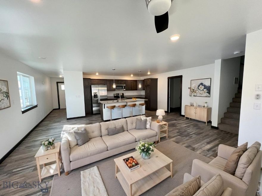 Welcome to this brand-new construction 1,642 sq ft 3 bed, 2.5 bath townhome, thoughtfully designed with comfort and functionality in mind. This end unit offers added privacy and ample natural light through its bright windows.

The main level features an open-concept layout that includes the living room, dining area, and kitchen—ideal for everyday living and hosting. Quality finishes include granite countertops, solid wood trim, gas fireplace, modern cabinetry, and a Central Air Conditioner to keep you cool in the summer months. A half bath, laundry area, and attached 2-car garage complete the main floor.

Upstairs, the layout includes a primary bedroom with a private bathroom and two additional bedrooms served by a shared full bath.

Some photos are of similar units; colors and finishes may vary.

Additional highlights include underground sprinklers, low-maintenance landscaping, and durable construction.

This home is move-in ready and offers a well-balanced combination of style and practicality.