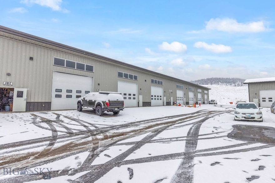 The Ultimate "Everything" Space
Whether you are looking to expand your business footprint or finally solve your "too many toys" dilemma at home, this 1,200 sq. ft. commercial condo offers the perfect blend of utility and location. Built in 2021, this modern, heated warehouse/shop space is designed to handle the rugged Montana lifestyle.

Property Highlights
Prime Location: Ideally situated just 10 minutes from Big Sky Town Center and a scenic 50-minute drive to West Yellowstone, making it a strategic hub for both local work and regional play.

Massive Volume: Boasting 20+ foot ceilings, this unit provides ample vertical space for mezzanine storage, tall racking, or high-profile vehicles.

Easy Access: Features a large overhead garage door for vehicles and equipment, complemented by a dedicated man-door for convenient everyday entry.

Climate Controlled: Fully heated, ensuring your gear and inventory stay protected from the Big Sky winters.
