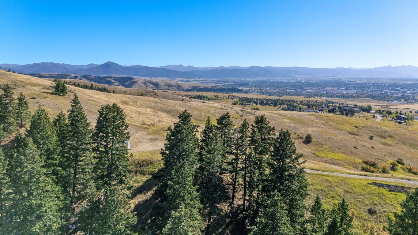 11+ Acres on the west side of the Bridger Mountain Range with Panoramic Mountain Views – Minutes from Downtown Bozeman
Discover the perfect blend of convenience and seclusion with this rare 11+ acre parcel just outside of downtown Bozeman. Nestled near popular trailheads and the Bridger Creek Golf Course, this property offers breathtaking panoramic views of the Gallatin Valley, Bridger Mountains, Beartooth, Spanish Peaks, Madison and Tobacco Root Mountains.
A leveled build site and access road are already in place, making it easy to bring your vision to life. Enjoy daily visits from local wildlife including turkeys, elk, and deer, all while being only minutes from the heart of Bozeman.
Whether you’re dreaming of a private estate, recreational retreat, or investment opportunity, this property offers unmatched views and location.