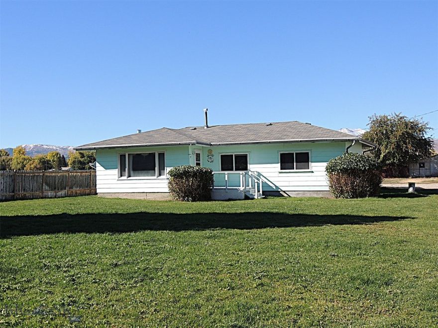 This 2+ bedroom 1 bath home on .57 acres has much to offer. Located in Opportunity, it is country living and the possibility of having enough room to grow a large garden or to have a playground for family and pets. The old barn can be used as a workshop, garage or for storage. The underground sprinkling system makes it easy to keep the  lawn nice and lush. The separate well in tha back is for irrigation and hooks up to a line along the fence.
The Opportunity Community Park is less than a block away and the Anaconda Country Club is a minute drive to go golfing. The home had some updates and its new owner has many possibilities to make it just the way they love it. Call today to make an appointment to view this property.  Agents: See Agents Remarks Section