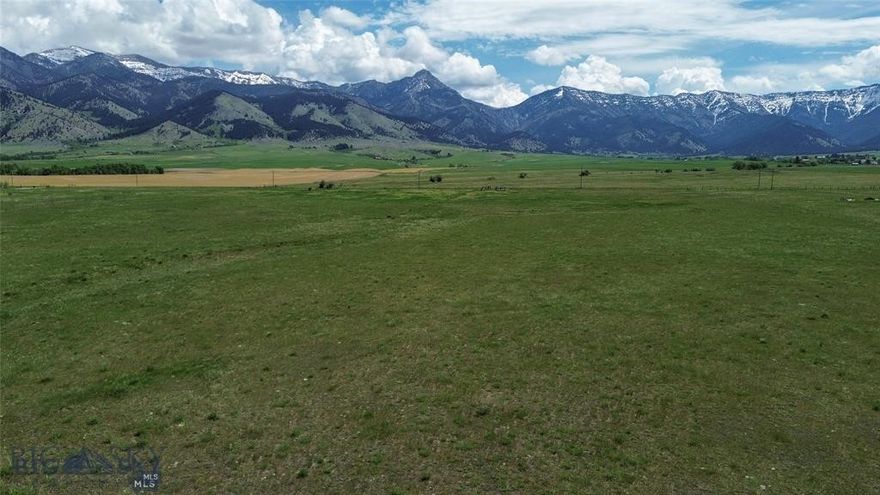 Beautiful 20 acres with county road access, fenced boundaries, underground electricity to build site. live water, and incredible views.