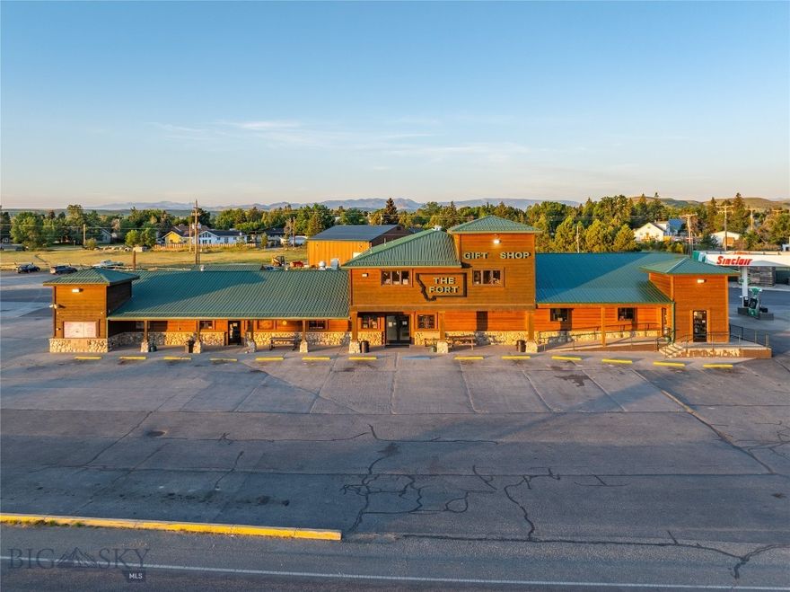 For the first time in 40 years this iconic business is now being offered, and Hayden Outdoors Real Estate is honored to represent, The Fort in Big Timber, Montana. The Fort is a welcoming convenience store located in the heart of Big Timber MT. Offering a variety of everyday essentials snacks and drinks it serves as a convenient stop for locals and travelers alike. With friendly service and a cozy atmosphere, The Fort is the perfect place to grab what you need on the go. The Fort sits on approximately 3.25 acres on the eastern edge of town. The property is hooked up to city water and sewer, three phase power, and it also has a dug well-used for irrigation of lawn. The main building consists of 11.000 SQ/FT of retail space, there is also a 50×50 shop, 28×48 shop, and 16×24 storage shed. The Fort is a welcoming convenience store located in the heart of Big Timber MT. Offering a variety of everyday essentials snacks and drinks it serves as a convenient stop for locals and travelers alike. With friendly service and a cozy atmosphere, The Fort is the perfect place to grab what you need on the go. The Fort sits on approximately 3.25 acres on the eastern edge of town.  The property is hooked up to city water and sewer, three phase power, and it also has a dug well-used for irrigation of lawn. The main building consists of Fuel Storage: 1-10,000gal Diesel 60/40 split Red Dye and Premium gas. 1-10,000gal #2 Clear Diesel. 1-20,000gal no lead gas. Pumps: 2- Red Dye Off Road Diesel east side. 3-Clear Diesel with one slave pump for trucker’s east side. 1 -DEF tank east side. 6-gas pumps on west side. 6-diesel pumps on westside. The 50×50 shop has four overhead doors, water plumbed in with sink, Natural Gas heat, all finished with concrete floor. The 28×48 shop has two overhead doors, water plumbed in with bathroom, 10×12 walk in freezer, and Natural Gas heat. Montana’s one stop shop. The Fort can get you down the road as they are a Sinclair Fuel Station with high flow diesel pumps and Tesla Charging. You will find a well-stocked convenience store and quick serve deli to fill you up. Thousands of firearms are the feature of our sporting good shop where you will find even the most uncommon current production ammunition. The anglers will find a well-stocked lure and tackle selection, live bait, and quality affordable gear. The fly fisherman will find they offer a great selection of quality, affordable flies and the gear to outfit you.