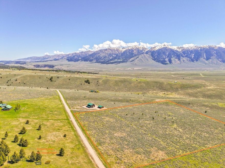 Stunning 20-Acre Parcel in Madison River Ranches with views & private Madison River access This premier 20-acre lot is located in Madison River Ranches, one of the Madison Valley’s most sought-after recreational communities. Positioned on a gentle east-facing slope, the property offers panoramic views of the Madison River Valley and surrounding peaks of the Continental Divide. Power, and fiber optic internet to the lot line, it's ready for your dream build. This property boarders a large ranch under conservation to the south and National Forest to the southwest.  Madison River Ranch allows for seasonal use of a self contained recreational vehicle on any tract for up to 120 days during any calendar year. The land features a scenic mix of wildflower-filled meadows, native grasses, and sage.  Multiple building sites offer excellent privacy and sweeping views. Roads are maintained seasonally; winter access is limited. Property ownership includes exclusive access to a 55-acre private HOA park on the Madison River, renowned for its blue-ribbon trout fishing. As well as non-public gated access to thousands of acres in the adjoining Beaverhead National Forest. Additional outdoor recreation includes nearby Wade and Cliff Lakes (1 mile), Quake and Hebgen Lakes, and Yellowstone National Park (about 30 minutes away). The area is rich in wildlife, with elk, mule deer, antelope, and waterfowl frequently seen throughout the ranch. Whether you’re looking for a seasonal retreat, a legacy property, or a home base for adventure, Lot 23 offers a rare combination of seclusion, scenery, and access to some of the best fishing and recreation in Montana.