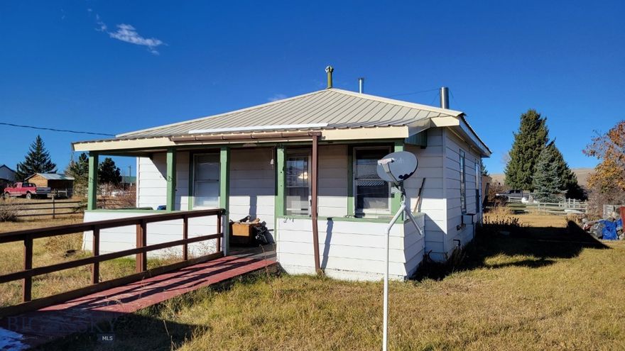 Featuring a cozy getaway in the heart of recreation country, this one-bed home is easy to maintain and is handicap accessible. It has a new roof, new siding, a newer hot water heater, and some new windows. You walk up to a covered front porch and into the living room. Beyond is the kitchen and a laundry area. To the left of the living room is the master bedroom with bathroom, connecting also to the kitchen.  Sitting on a corner lot, outside the flood zone, it has many options for outside use. Lima is in the heart of Montana elk hunting and nearby Blue-Ribbon trout fishing, the friendly community is very welcoming and has wonderful dining options. Please call for a showing, you don't want to miss this small town opportunity!