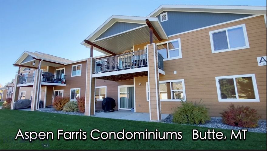 Welcome to The Aspen Farris Condominiums! Each unit features 2 spacious bedrooms and 2 full bathrooms, including a Master Suite with a generous sized closet. Enjoy the open floor plan that seamlessly connects the Kitchen to the Living Room. Additional features include a laundry area and a cozy porch. Each unit comes with it's own single-car garage (the garage for this unit is #11). The complex consists of 3 buildings, each housing 8 units. Built in 2010, the complex has transitioned from rentals to charming condos. HOA dues are $ 225 per month which cover insurance, heat, common area maintenance, exterior lawn care, snow removal, etc. The complex is conveniently located in downtown Butte. (Pictures are of another unit with a very similar floor plan.