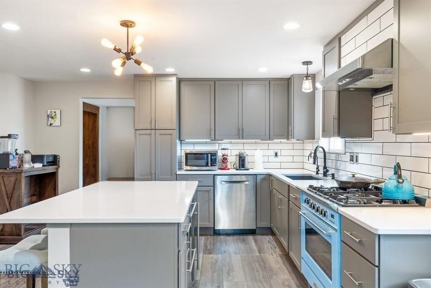 Experience Paradise Valley at its finest! This exceptional property features a beautifully renovated 3-bedroom, 2-bath, 3,200-SQFt home; a massive 2,000-SQF temperature-controlled shop; 2 custom cabins & a private lot w/unobstructed views of Paradise Valley's Absaroka Mountain Range! In addition, this home has been newly renovated w/a sophisticated-vintage design that seamlessly blends clean, modern lines w/high-end materials. The kitchen is a true SHOWSTOPPER, w/marble-inspired quartz countertops, great cabinet & counter space, a large island & premium appliances! - You'll love the vintage-inspired Verona gas range in a vibrant blue. Open concept living & dining areas feature vaulted ceilings & oversized glass doors that flood the space w/natural light & endless mountain views. The living room is warm and inviting, w/a retro vibe inspired by the cast-iron gas stove w/its natural stone surround! The private master bedroom w/a spa-like ensuite offers an oversized soaking tub, a walk-in shower, a generous closet space & its own hot water on-demand system. The west wing of the house is built into the hillside & offers great storage & pantry space; a stylish 3/4 bath w/custom tile; an office space / family room; laundry area w/a stackable washing machine & dryer & 2 additional bedrooms & access to the basement. The basement is a versatile 700-SQF space that includes water, upgraded electrical services & a private exit that opens to the lower lot!  On the lower lot, two custom cabins built w/reclaimed lumber, metal roofs, covered porches & private driveway access are ready for your finishing touches! The 2,000-SQF shop is fully equipped w/state-of-the-art heating, cooling & electrical systems, making it ideal for multiple purposes —the small town of Emigrant, Montana, has it all - a grocery store, a local bank, a post office, fly shops, restaurants, bars & a vibrant local scene w/live music at the historic Old Saloon!. In addition, Emigrant offers endless adventures on the Yellowstone River & a five-star restaurants  at Chico Hot Springs and Sage Lodge & is just 30 minutes from Yellowstone National Park & 20 minutes to the lively town of Livingston, Montana! SELLER FINANCING AVAILABLE!