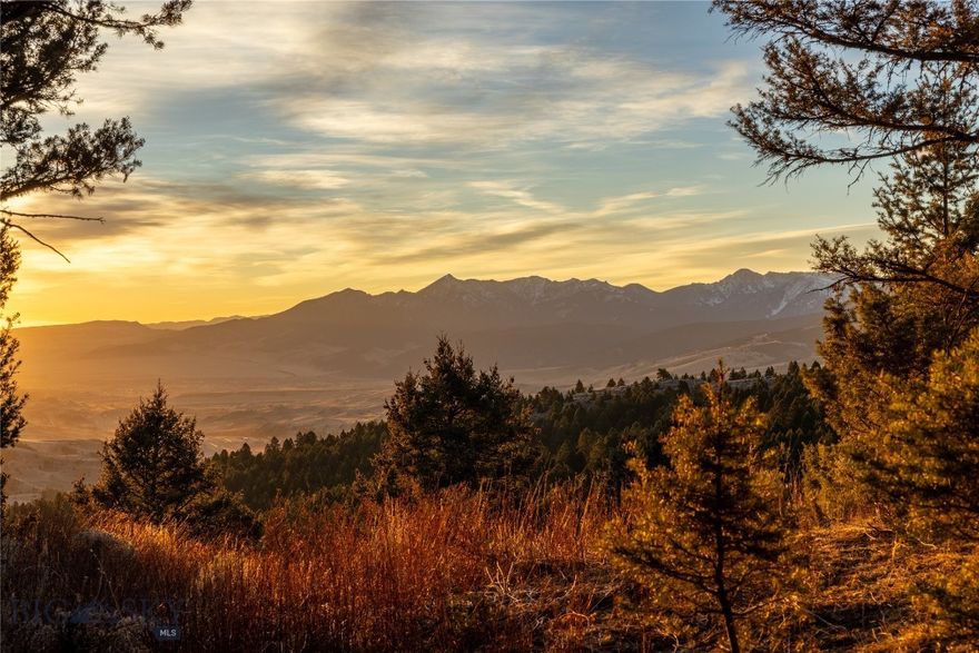 Set opposite the dramatic skyline of the Absaroka-Beartooth range, this extraordinary 20-acre parcel offers a rare opportunity to own a piece of Montana wilderness just outside Bozeman. Mature pine blanket the land, creating a sense of timeless seclusion that frame sweeping, unobstructed views, both intimate and immense. A sandstone ridge adds a rugged band amidst inviting beauty, a foundation to build on just below the ridge line to the west, providing protection from wind and snow. Abundant wildlife—elk, deer and moose—offer immediate connection with nature all without compromise to modern convenience. Reliable 5G cell service ensures you stay connected when desired, while still enjoying the peace and privacy of a truly remote setting. The property remains untouched, presenting a blank canvas for a discerning buyer to create a legacy estate tailored to their exact vision. The absence of infrastructure is not limitation, but an invitation. For those who seek not just a property, but a statement—of independence, vision, and elevated living—this is a rare and compelling offering.