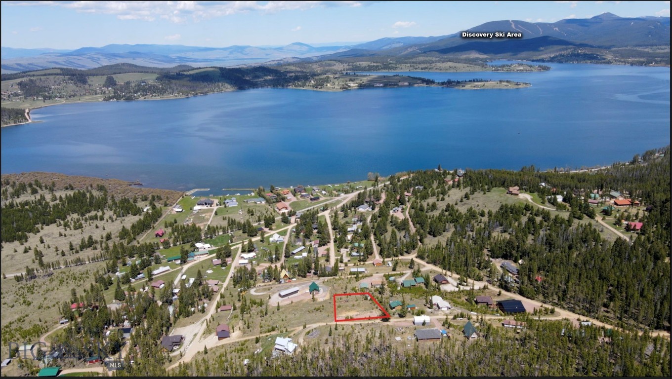 This turnkey lot is up and ready for your year round adventures. The well is in, an oversized septic system has been installed and there is power to the lot. Park your camper this summer and begin construction on your new home. Views across Georgetown Lake and of Discovery Ski Area are unobstructed. Philipsburg and Anaconda are each an easy 20 min drive away and both offer unique restaurants, breweries, and shopping. The Deer Lodge National Forest may be accessed just up the hill, so your recreational opportunities are truly endless from this property. Please go take a peek for yourself! Lot lines are approximate.