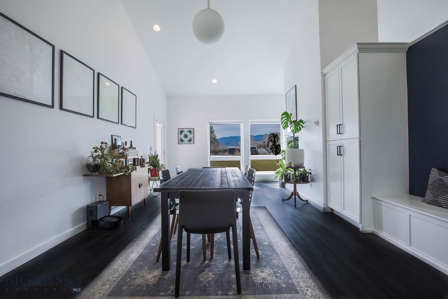 Step inside and experience a home that has been completely reimagined—where thoughtful updates meet timeless character. With 4 bedrooms, 3 bathrooms, and multiple living spaces, this property offers both flexibility and comfort for everyday living.

The main level features a spacious primary suite with the convenience of main-floor laundry, while two separate living areas provide room to gather, unwind, or entertain. A dedicated flex space—currently used as a gym—adds even more versatility, and a one-of-a-kind bunker room, now a music space, offers a truly unique element you won’t find anywhere else.

At the heart of the home, a grand brick fireplace makes a striking statement, adding warmth and architectural presence. The home has been thoughtfully updated throughout, with modern finishes, fresh paint, and curated design details that create a cohesive, move-in ready feel.

Situated on a half-acre, the property includes both an attached single-car garage and an additional detached single-car garage—offering space for vehicles, toys, or projects. Step out back to a concrete patio where mountain views set the tone for quiet mornings or evening gatherings.

Located in the heart of Boulder, this home captures quintessential small-town Montana living while remaining centrally positioned for easy access to Helena, Butte, and Bozeman. From your garage, ride directly out to nearby trails and endless recreational opportunities just minutes from your door.

This is a home you truly have to experience in person to appreciate.