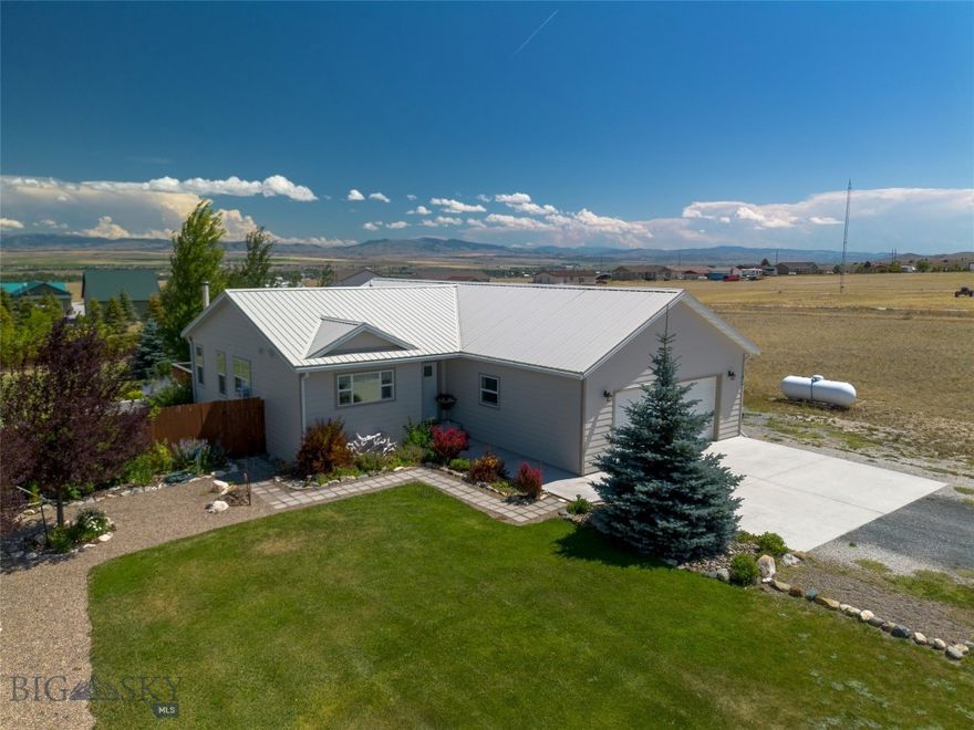 Here is the serenity you've been looking for. This beautifully-maintained, single-level, single-owner, 3 bedroom, 2 bathroom home offers a perfect blend of comfort and charm with 1,413 square feet of living space. From the moment you step inside, the open concept layout creates an inviting and airy atmosphere, seamlessly connecting the living areas to make the home feel spacious and bright. Every corner of the interior reflects true pride of ownership, ensuring a move in ready experience for the next proud owner. The exterior is a nature lover’s dream, featuring beautiful landscaping that sets this property apart. The expansive, fully-fenced backyard serves as a private sanctuary, complete with a dedicated garden area for your seasonal plantings and a tranquil rear porch perfect for soaking in the Big Sky sunrises. Practicality is just as prioritized as aesthetics, with a spacious two car attached garage providing plenty of room for vehicles and outdoor gear. This home is a rare find that perfectly captures the peaceful, outdoor oriented lifestyle that Townsend is known for. Canyon Ferry Lake is minutes away, as are the Elkhorn Mountains.