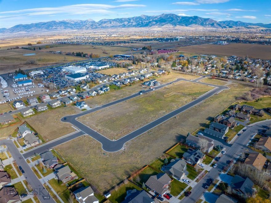 New single-family subdivision lots ready to build. Woodbury Grove Subdivision combines the beauty of Montana's rural landscape with the convenience of living just minutes from everything Bozeman has to offer. This subdivision offers wide streets and sidewalks creating a neighborhood feel rarely found outside Bozeman city limits. A Master Plan designed to create multiple living options from single family homes to townhouse lots and a few condo units will create an intimate community for every home as the development grows. Traditional architecture, responsible design, quiet streets, and more make Woodbury Grove perfect for families with children to build a community together over time. Located on the west side of Bozeman, 10 minutes from downtown or 10 minutes to the Gallatin River.