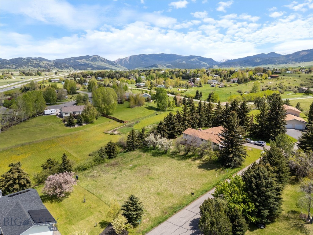 Rare opportunity to build on Bozeman’s southeast side in the established Sunset Heights subdivision. This 0.46± acre lot backs directly to a creek-lined park space and features open mountain views, mature neighborhood character, and low traffic. The gentle slope of the lot lends itself well to a variety of design options, with ample space for a home, shop or potential accessory dwelling unit. There’s no HOA, and covenants are minimal with chickens allowed and only larger livestock restricted. Electricity and natural gas are available in the area; buyer to install private well and septic. Located just minutes from downtown Bozeman, the hospital, MSU, and the local trail system, this lot offers a rare mix of privacy, proximity, and flexibility. One of the last remaining vacant parcels in this tucked-away, quiet subdivision. Whether you’re a luxury homebuyer, investor, or someone looking to put down roots in Montana, this lot checks the boxes for location, setting, and long-term potential!