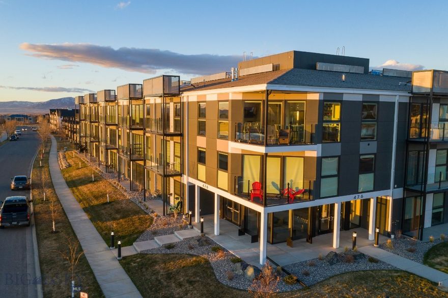 Beautiful modern 1-bedroom end-unit condo in Talbach Houseo nestled in  Meadowlark Subdivision on Bozeman’s desirable Southside. This first-floor, lock-and-leave residence is conveniently located within the complex and filled with natural light. The open kitchen and living area feature floor-to-ceiling windows and a southeast-facing patio, perfectly positioned to capture afternoon sun. Elevator access leads to a fully equipped second-floor gym and a third-floor yoga studio with stunning Bridger Mountain views. Includes dedicated parking and private storage—ideal for skis and gear. Low-maintenance living in a prime location.