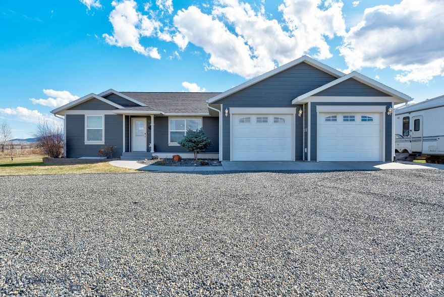 Your complete turnkey home awaits in the beautiful east valley of Helena, Montana. Nestled on the outer edge of a small subdivision, and just a five minute drive from recreational heaven at Hauser Lake, The Causeway, Fox Ridge Golf Course, and nearby Holding Reservoir. Enjoy gatherings on the fully landscaped lawn, nurturing an established garden, or grilling on your back patio watching the sun come and go behind a picturesque mountain-scape. This five bedroom, over 3300 square foot home has two additional "bonus" rooms including a playroom with darling built-in reading nook, and hobby room for him or her. The home was custom built, recently remodeled, and maintained with love and thoughtful amenities. This home was pre-inspected for listing and full report is available for all buyers. 

Full Feature List Below: 
Fully Pre-Inspected by Guardian Home Inspections. SO MANY UPGRADES AND ADDITIONAL AMENITIES!!! Custom Built home by Mike Hughes INCLUDED PERSONAL PROPERTY: Refrigerator, Stove range, Dishwasher, Microwave, 2 sheds, playground set, and Hunter Douglas Blinds. EXTERIOR FEATURES: Fully landscaped, .978 acres. Circular driveway. Covered front porch with concrete sidewalk pathway. RV and boat parking. Gutters. Stamped concrete back patio with gas plumbing for bbq. 12 zones for u/g sprinklers. Garden beds with floral and established raspberry bushes. Play-ground set. Storage shed. Roof is original and recently inspected to confirm great condition. South property line is fenced. 30’ easement utility access on the east side property boundary. Siding is under warranty- west side wall has been replaced. Private Well and Septic. Community shared drain field. HOA is $40/month. INTERIOR FEATURES: Garage is insulated, sheet rocked, and heated. Accommodates most trucks. Work bench and cabinetry are installed. Systems: Reverse Osmosis system installed serving the kitchen sink and refrigerator. Passive Radon System installed. New hot water heater: 45 gallon. Water softener. Pressure tank. HVAC humidifier system. Air conditioning. Forced Air Heating. Kitchen: Oak hardwood flooring. Black granite countertops by Silver City Cabinets & Countertops. Pantry. Sliding glass door exits to back patio. Primary Bedroom has a walk in closet, expanded en suite with double sinks, vanity, garden bathtub and step in shower. The two guest bedrooms on main have closet systems. BASEMENT FEATURES: 800 BTU Electric Fire Place. New carpet with top grade Tempurpedic padding.