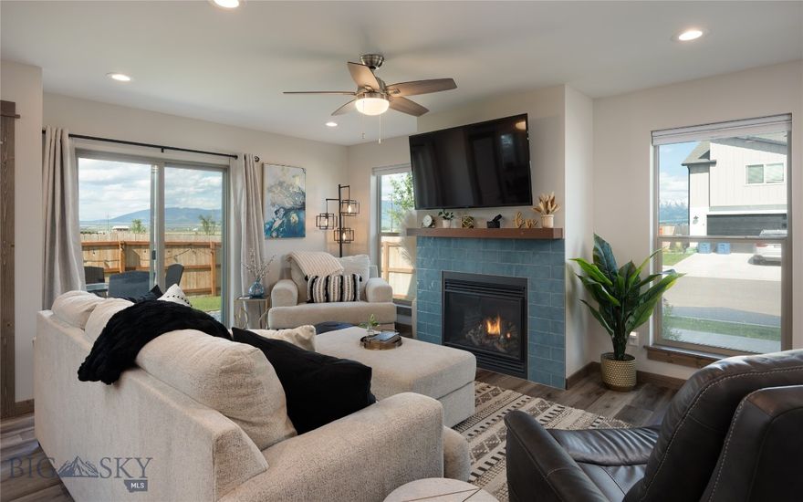 Beautifully maintained and move-in ready, this like-new end-unit townhouse offers stunning Bridger Mountain views from a quiet corner lot. The spacious layout features an open-concept main level with upgraded finishes, modern lighting, and large windows that flood the space with natural light. Upstairs, you'll find generously sized bedrooms, including a primary suite with walk-in closet and en suite bath. Enjoy the convenience of a low-maintenance backyard, attached garage, and easy access to Belgrade’s growing amenities. Whether you're a first-time buyer, downsizing, or seeking a lock-and-leave home base near the airport and Bozeman, this thoughtfully cared-for property is a standout in today's market.