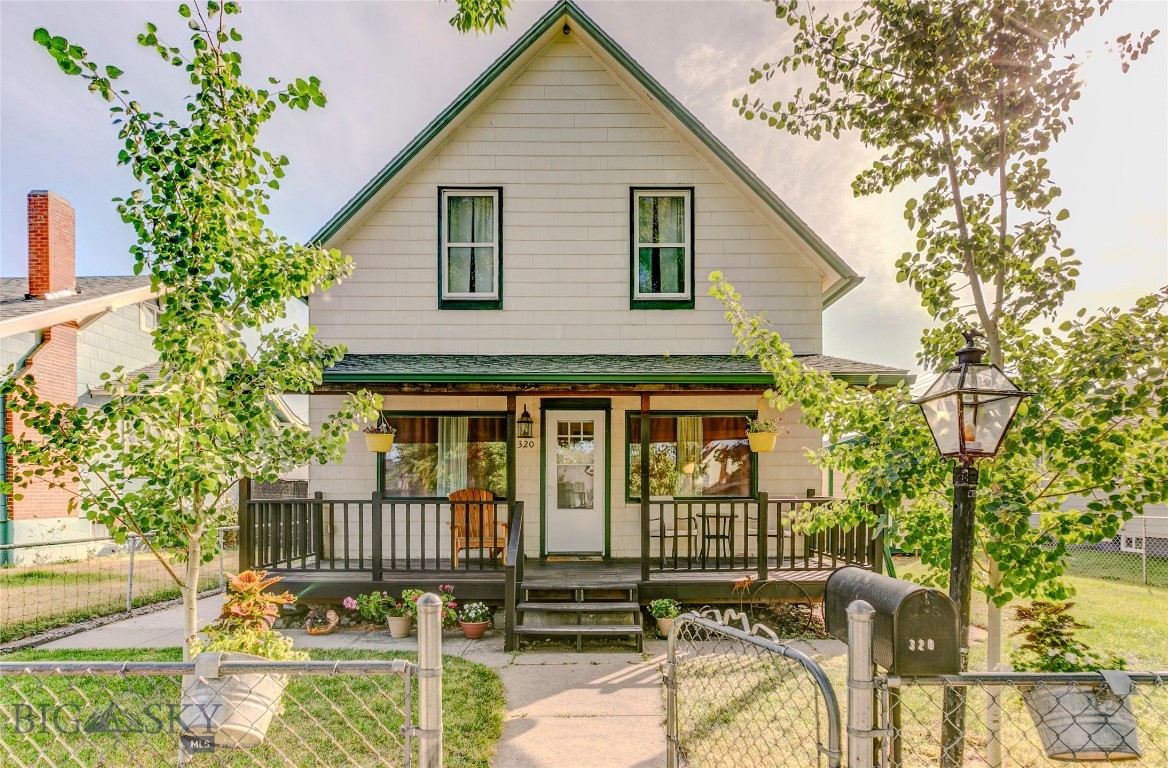 Welcome to this charming 1908 home in historic Livingston, ideally situated on the picturesque, tree-lined 300 block of North 2nd Street. From your front yard, take in stunning views of the iconic Livingston Train Depot framed by majestic mountains.
The main level features a thoughtfully remodeled bedroom and bathroom, along with a homey kitchen, dining room, and inviting living space—blending vintage character with modern comfort.
Set on a generous 7,000 sq ft lot, this updated 3-bedroom, 2-bath home offers timeless appeal and practical upgrades. A standout feature is the oversized 960 sq ft two-car garage, built in 2017, with tall ceilings, a durable metal roof, and a seller-owned solar array—ideal for trucks, tools, and all your Montana gear.