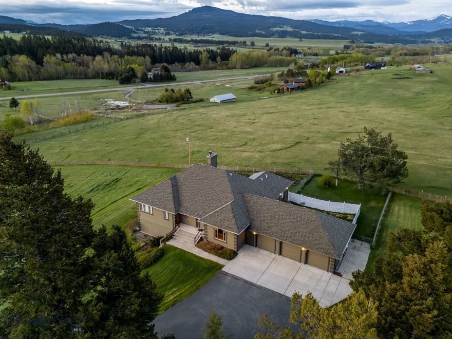 Discover your mountain oasis in Bozeman, MT. Just minutes from world class skiing, biking and hiking, this spacious and quality custom home puts you in the perfect place to enjoy all Montana has to offer. Nestled on just over 4 picturesque acres in the heart of Bridger Canyon and boasting breathtaking mountain views, this property offers the perfect blend of tranquility and convenience, with easy access to recreation and 15 minutes to vibrant downtown Bozeman. The expansive layout provides ample room for entertaining and relaxation, allowing you to customize the space to fit your lifestyle. Imagine cozy evenings by the wood burning fireplace or hosting summer barbecues while soaking in the stunning scenery. Enjoy main level living, with a sprawling primary suite on the main floor. The basement features an expansive, walk-out den complete with beautiful built-ins and a new efficient wood burning stove. The lower level accommodates recreation, media, home office or guests. With plenty of outdoor space, this property invites you to explore and enjoy the natural beauty of Bridger Canyon. Whether you’re an outdoor enthusiast or simply seeking a peaceful retreat, this home presents incredible opportunities to make it your own. Don’t miss your chance to own a slice of paradise in one of Bozeman's most sought-after locations.