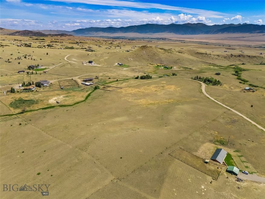 This 20-acre parcel offers the ultimate Montana lifestyle with wide open space, stunning mountain views, and complete freedom with no covenants. Take in panoramic vistas of the Madison Range and enjoy the natural beauty of your own spring, a rare and valuable water feature that enhances the land’s potential. Located between Bozeman and West Yellowstone, this property offers unbeatable access to both the amenities of town and the recreational wonders of southwest Montana. Whether you're into hunting, hiking, horseback riding, ATVing, or snowmobiling, this is a prime location for four-season adventure. World-class fly fishing on the Madison River is just a short drive away, and Yellowstone National Park is within easy reach for day trips. With the option to subdivide, this parcel offers flexibility to build your dream home, create a family compound, or hold as an investment. No HOA, no restrictions...just big sky, clean air, and endless opportunity.
