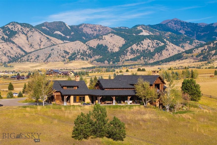 Welcome to Autumn Ridge – an exclusive gated community perched above the breathtaking Gallatin Valley. This is more than just a home; it’s a lifestyle surrounded by natural beauty and tranquility.

Designed by the renowned Kipp Halvorsen of Faure Halvorsen Architects, this rustic yet elegant 5-bedroom masterpiece radiates warmth, natural light, and thoughtful design. The home features radiant floor heating for ultimate comfort, a private hot tub to soak under Montana’s starlit skies, and a spacious three-car garage to accommodate vehicles, outdoor gear, and more.

Step inside to discover a stunning library with enchanting views, a welcoming fireplace room ideal for cozy evenings, and a dining area perfectly suited for memorable gatherings. A charming nook invites you to relax and unwind, soaking in the serenity of your surroundings. Outside, lush flower landscaping complements the natural beauty of the property, creating a picturesque and tranquil retreat.

Autumn Ridge is backed by the iconic Bridger Mountains, offering sweeping panoramic views of the Gallatin Valley that transform with the seasons. Each window in the home seems to frame a masterpiece, from golden sunsets over the valley to snow-dusted peaks in the distance.

For equestrian enthusiasts, the property includes a tack room and ample ground to customize for your horses. The fenced 35-acre estate offers privacy, peace, and room to roam, making it the perfect setting for those seeking a harmonious blend of luxury and Montana’s rugged beauty.

This property is truly an oasis for those who appreciate timeless architecture, expansive landscapes, and the opportunity to call this stunning piece of Montana home.