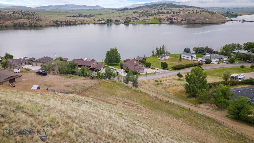2.34-Acre Lot with Stunning Lake & Mountain Views. Perched at the highest point of the desirable Settlers’ Cove neighborhood, this 2.34 acre lot offers breathtaking lake and mountain views in a peaceful, private setting. Located on the east side of Hauser Lake. This ready-to-build lot is already equipped with a well, septic system, and electricity, making it the perfect foundation for your dream home. With quick access to Highway 15, you’ll enjoy both seclusion and convenience—offering the best of Montana living. Don’t miss this rare opportunity to own a prime piece pf land in Settlers’ Cove!