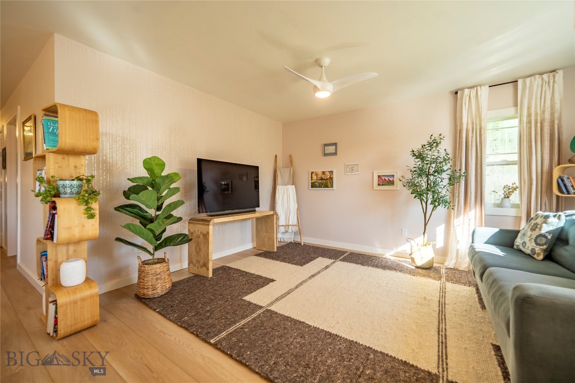 This beautifully refreshed 3-bedroom, 2-bathroom home blends clean Scandinavian simplicity with warm Japandi-inspired touches. Situated on a spacious lot with gorgeous mountain views the property features a thoughtfully designed front garden that welcomes you with color and curb appeal. Inside, enjoy fresh updates throughout including new paint, flooring, light fixtures, and beautifully updated bathrooms. The functional layout offers comfort and flexibility, while the expansive backyard provides ample space for pets, play, or future projects. Whether you're relaxing with a view or dreaming up your next outdoor endeavor, this property is packed with potential and ready to be enjoyed.