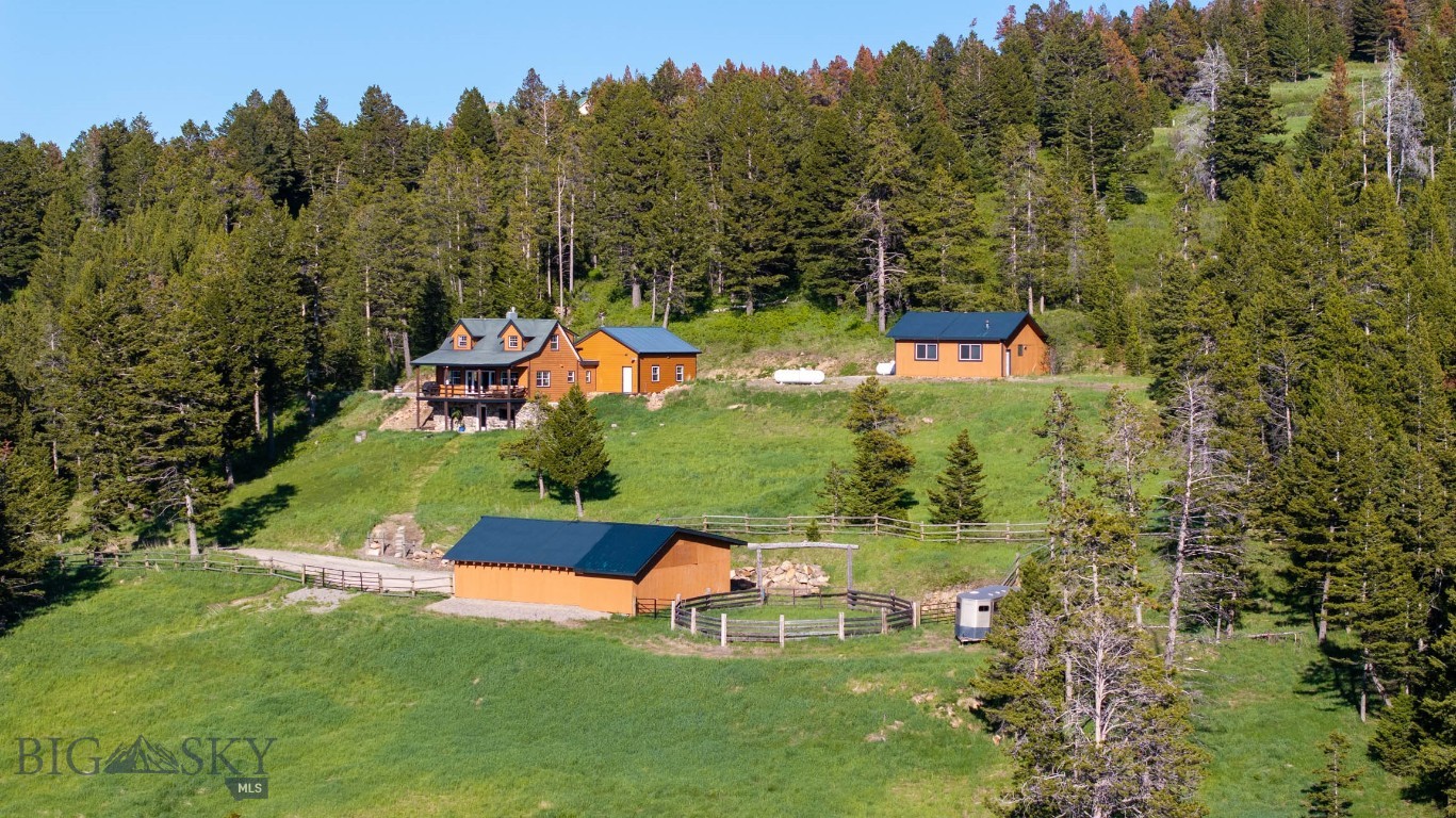 This is the Montana Experience! Up above the trees and in a quiet and peaceful place rests this beautiful property; 24.26 acres with sweeping views of the Bridger Mountains and the gorgeous valleys in between. This outstanding property boasts a tastefully updated home with a newly built attached and heated 2 car garage plus an additional 1 car detached heated shop; plenty of space to work on projects or park all your recreational vehicles! There is a sizable barn with room for hay storage and attached round pen and fully fenced pasture for your horses. Enjoy riding your horses on your land or to your neighbors, the surroundings could not be more beautiful. 100s of acres of state land nearby; the opportunities are endless, this is the Montana lifestyle. The spring fed pond brings year-round enjoyment as wildlife like Moose, Bear and Elk pass through and enjoy swimming and lounging in the pond; you won’t find that type of experience in town. The fabulous expansive deck at the house allows you to sit and take in all that this amazing property has to offer; every day will bring something new across your beautiful landscape, you can just sit back and enjoy! And the home is fully furnished; move in and immediately enjoy your Montana dream home! You don't need to bring a thing.